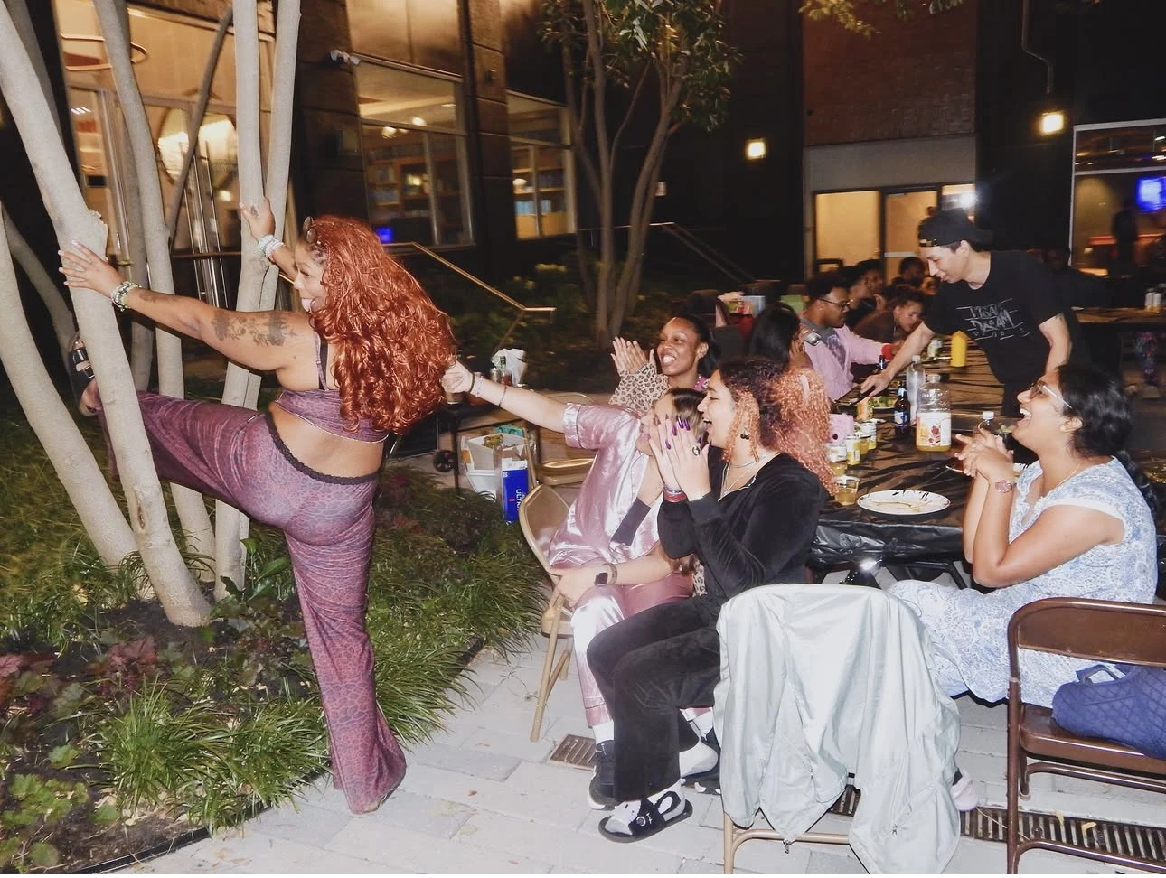 Real guests laughing and celebrating at a hibachi party