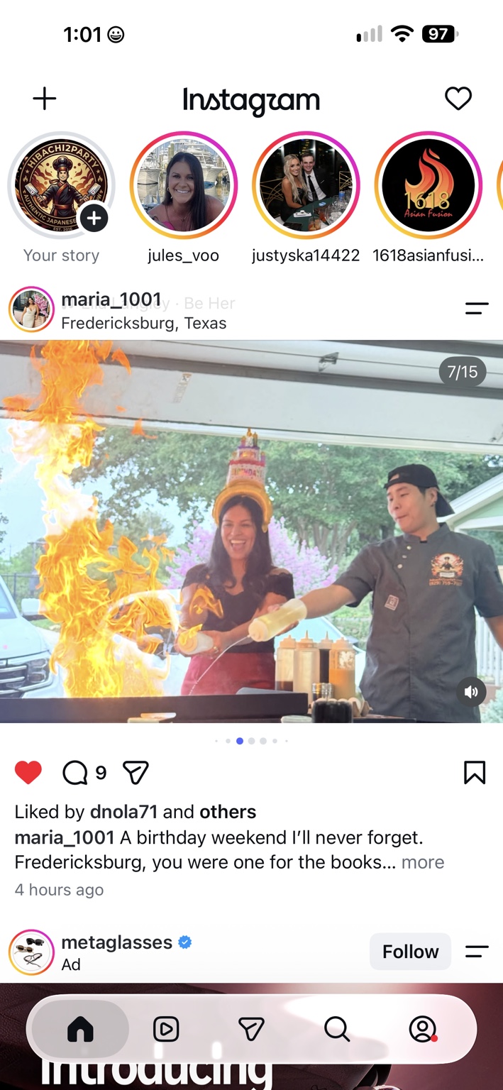 A birthday guest and hibachi chef enjoying the live cooking show